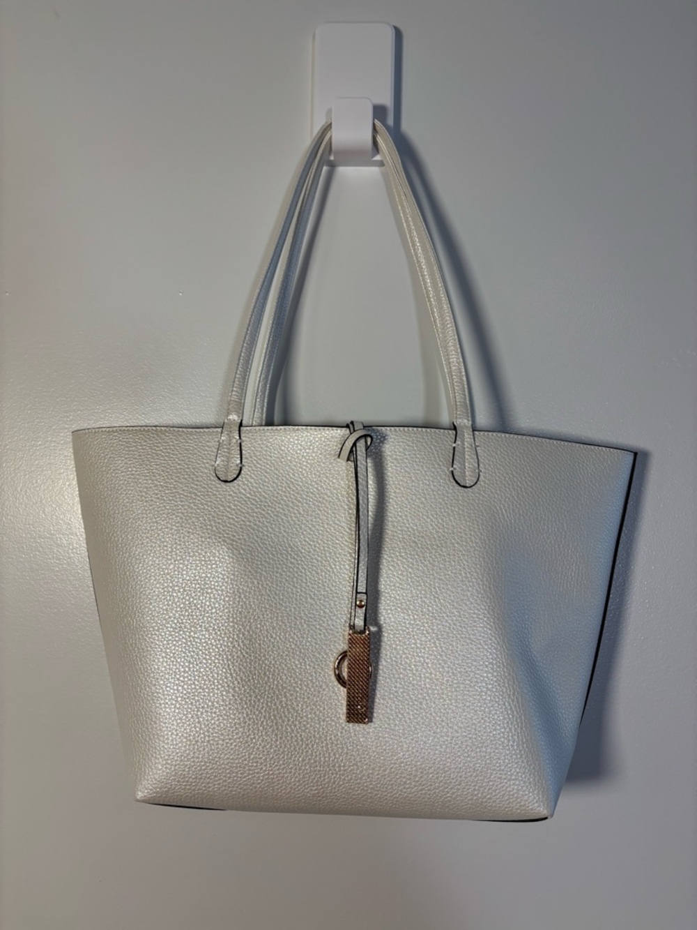 Kendra Reversible Vegan Leather Tote w/Gold Charm Accent Width 16” Length 10” - Picture 5 of 7